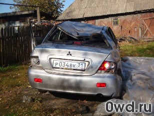 Битый автомобиль Mitsubishi Lancer